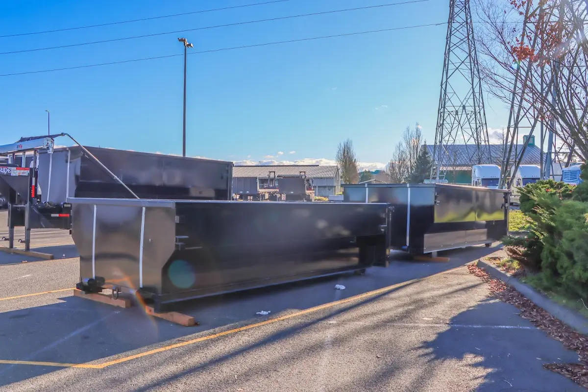 Roll-off dumpster ready for waste disposal at job site for Roofing Dumpster Rental in Green Oak
